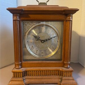 Elegant Wooden Mantel Clock with Gold Detailing